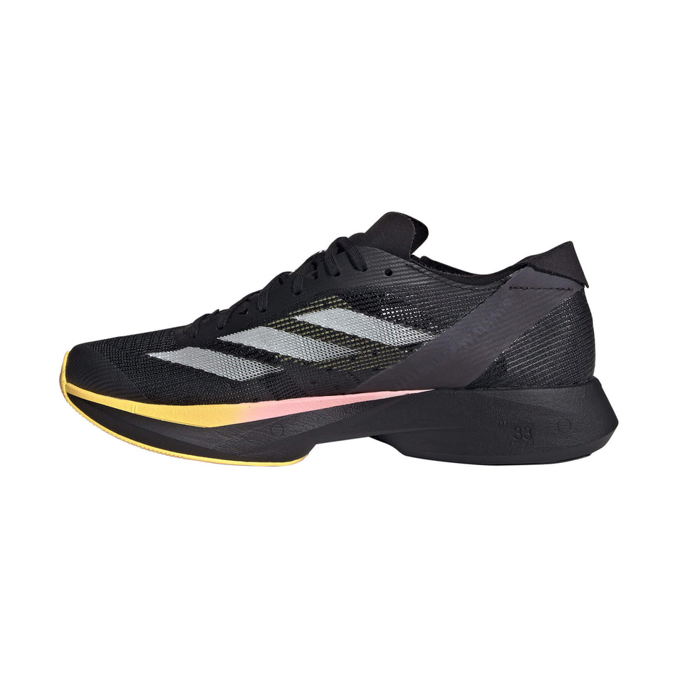 Mediaal side of the right shoe from a pair of adidas Women's Takumi Sen 10 Running Shoes in the Core Black/Zero Met./Spark colourway (8194325020834)