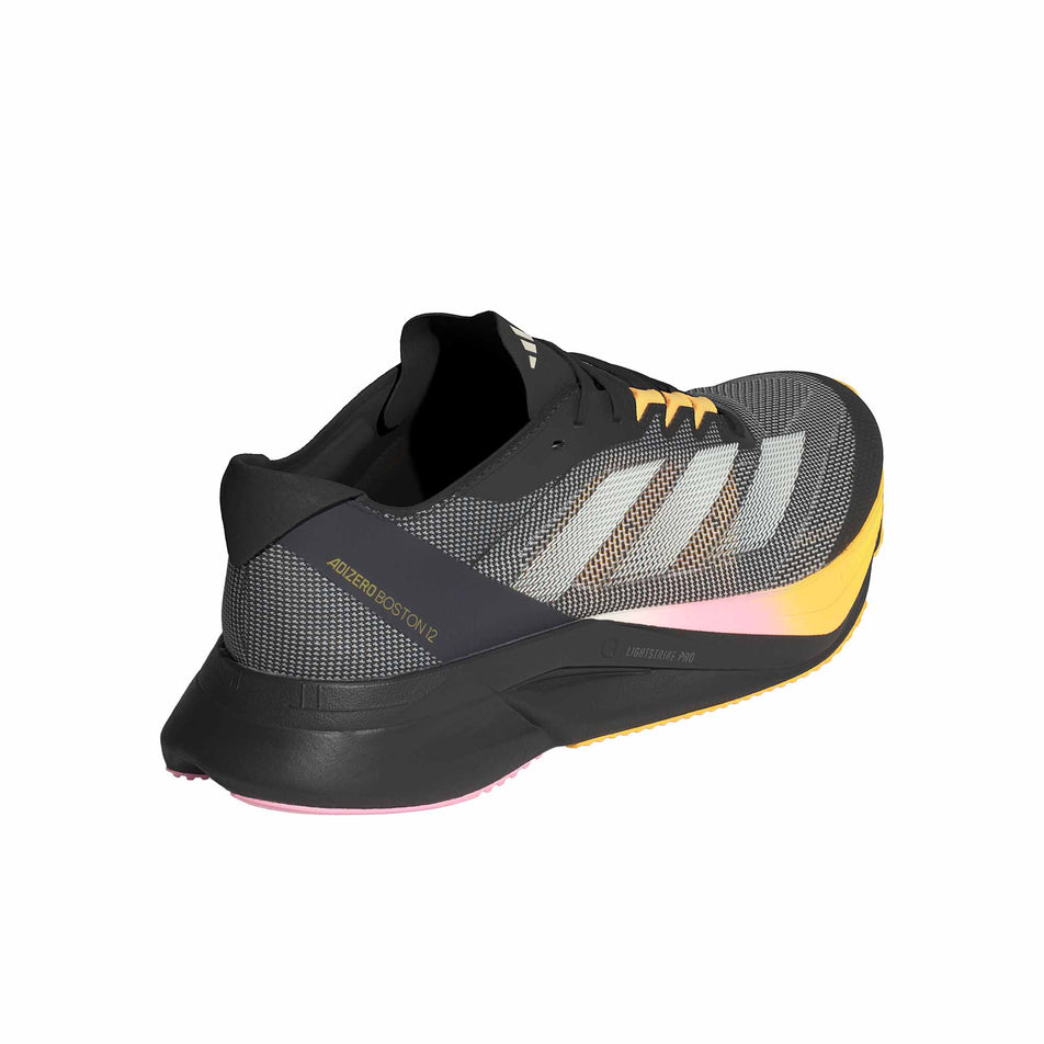 Lateral side of the right shoe from a pair of adidas Men's Adizero Boston 12 Running Shoes in the Core Black/Zero Met./Spark colourway (8339205652642)