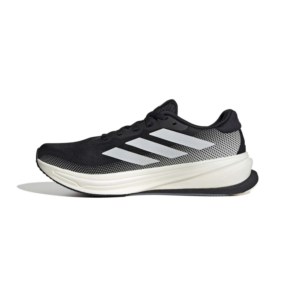 Medial side of the right shoe from a pair of adidas Men's Supernova Rise 2 Running Shoes in the Core Black/Zero Met./Core Black colourway.
(8566973661346)