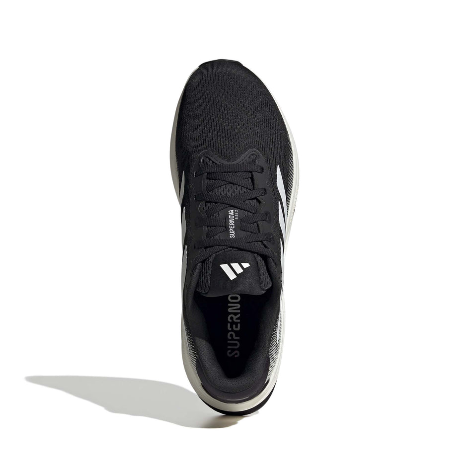 Upper of the right shoe from a pair of adidas Men's Supernova Rise 2 Running Shoes in the Core Black/Zero Met./Core Black colourway.(8566973661346)