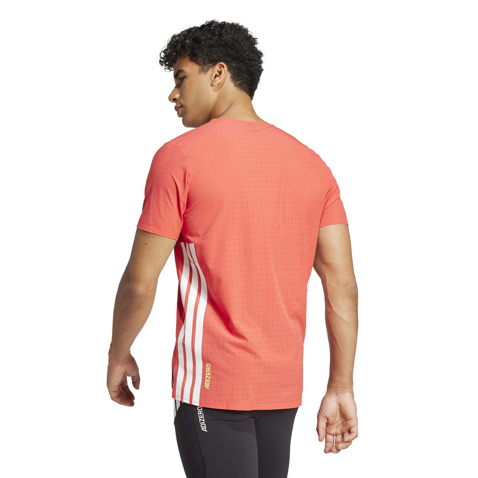 Back view of a model wearing the adidas Men's Adizero Tee in the Semi Lucid Red colourway.(8566631891106)