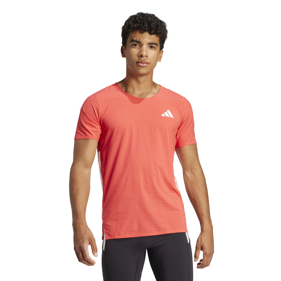 Front view of a model wearing the adidas Men's Adizero Tee in the Semi Lucid Red colourway. (8566631891106)