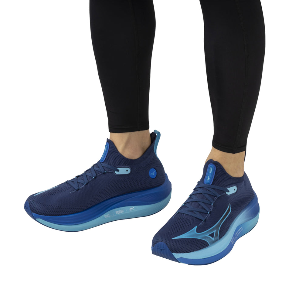 A model wearing a pair of Mizuno Men's Neo Vista Running Shoes in the Estate Blue/River Blue/Mugen Blue colourway (8339284394146)