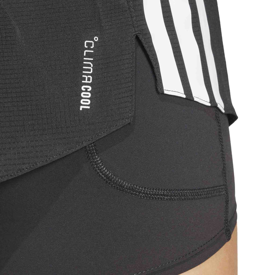 Close up view of the back right side of the adidas Women's Adizero 2in1 Short in the Black colourway. (8567010525346)