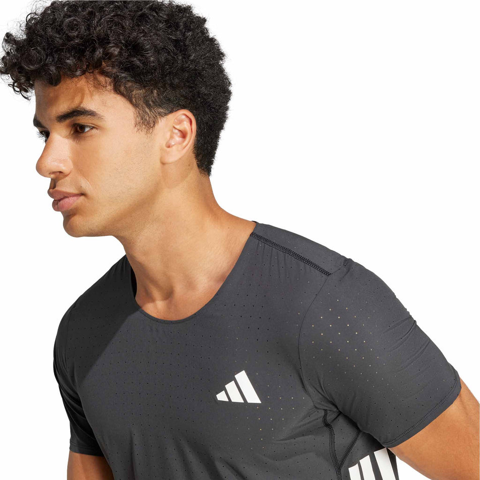 Front view of a model wearing the adidas Men's Adizero Tee in the Black colourway.(8566969630882)