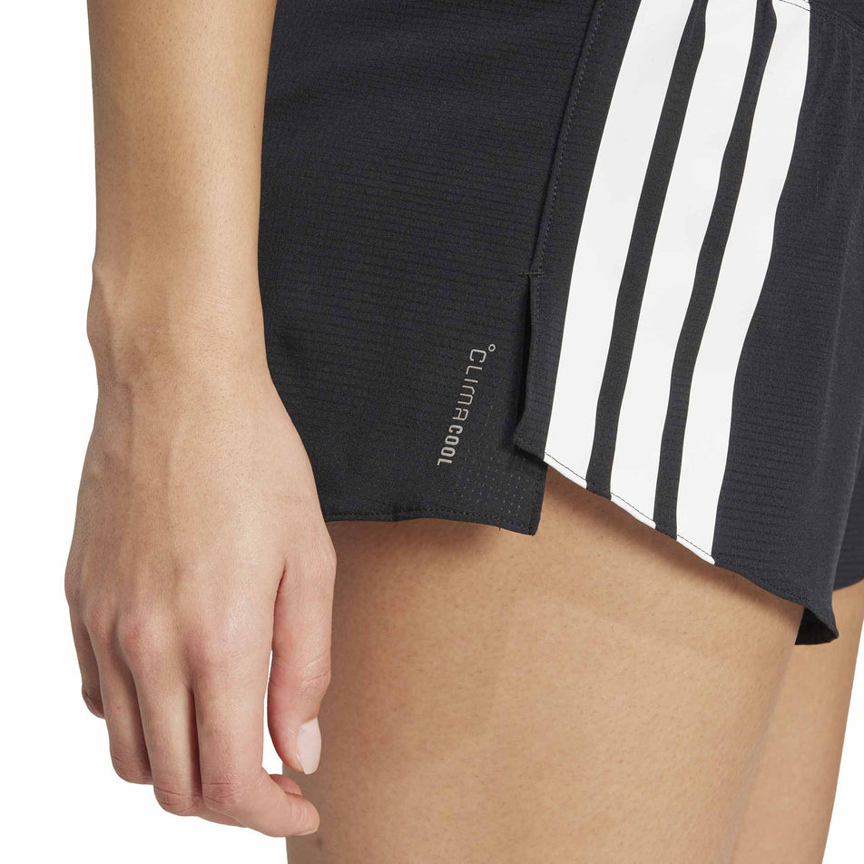 Close up view of the right side of the adidas Women's Adizero Gel Short in the Black colourway. (8567015407778)