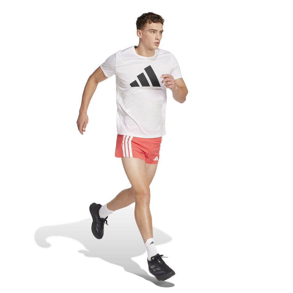 Front view of a model wearing the adidas Men's Adizero Gel Short in the Semi Lucid Red colourway. (8566998794402)