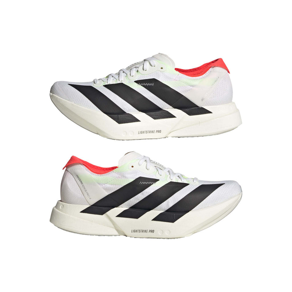 Lateral side of the left shoe and right shoe from a pair of adidas Women's Adizero Adios Pro 4 Running Shoes in the Ftwr White/Core Black/Silver Met. (8563430424738)