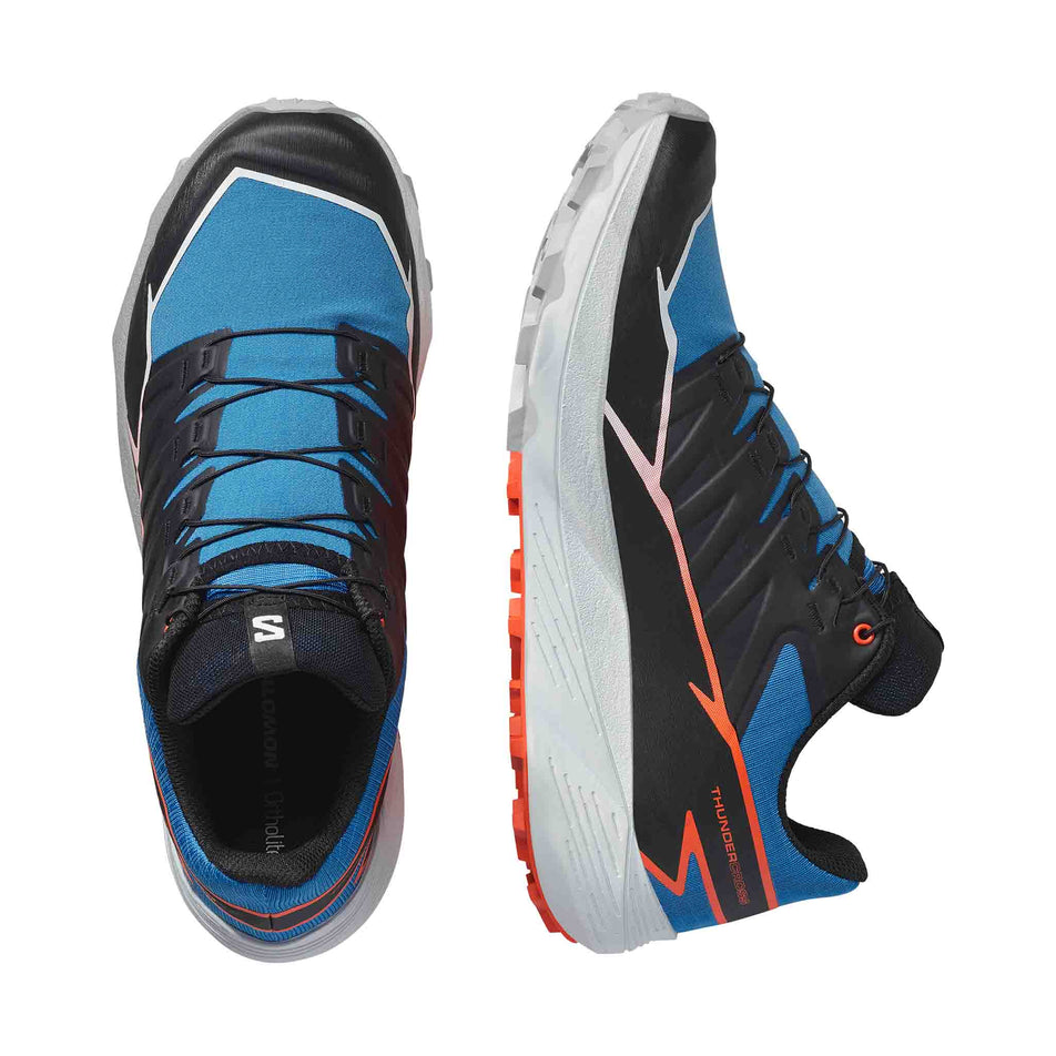 A pair of Salomon Men's Thundercross Running Shoes  in the French Blue/Black/Cherry Tomato colourway.  (8560936288418)