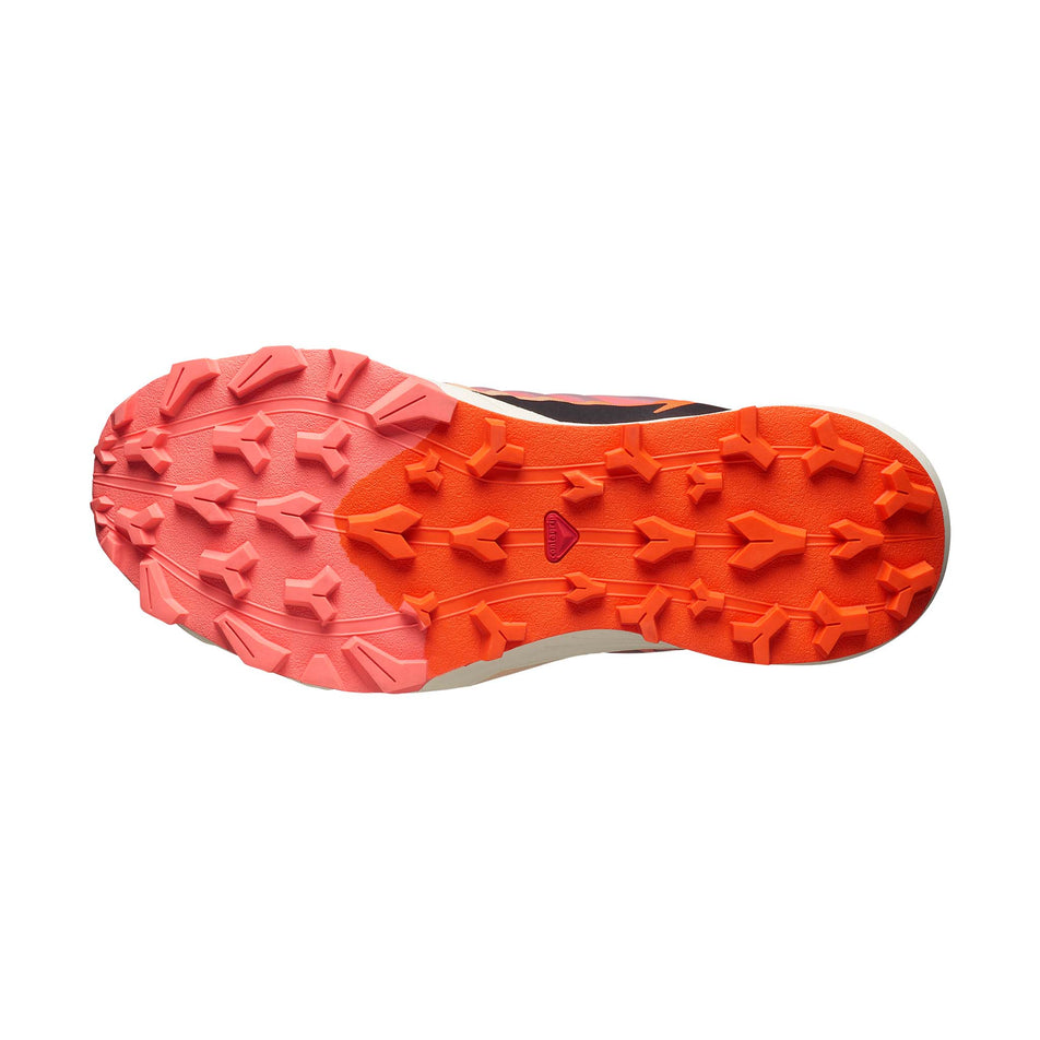 Outsole of the right shoe from a pair of Salomon Women's Thundercross Running Shoes in the Fusion Coral/Black/Red Orange colourway.  (8561652072610)