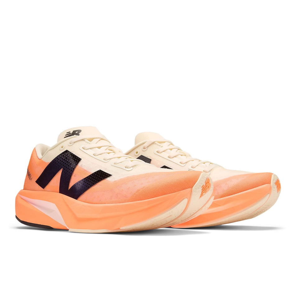 A pair of New Balance Men's FuelCell Rebel V4 Running Shoes in the Hot Mango colourway. (8570000507042)