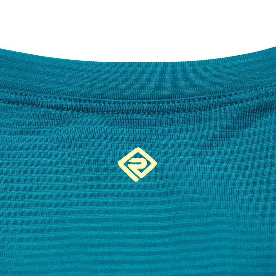 Close-up view of the Ronhill logo on the upper back of the Women's Tech S/S Tee. (8490105634978)