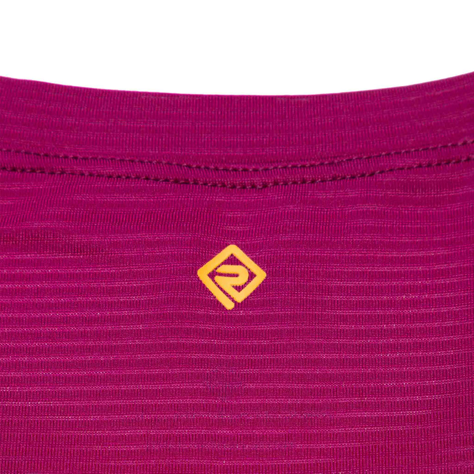 Close-up view of the Ronhill logo on the upper back of the Women's Tech S/S Tee. (8490111729826)