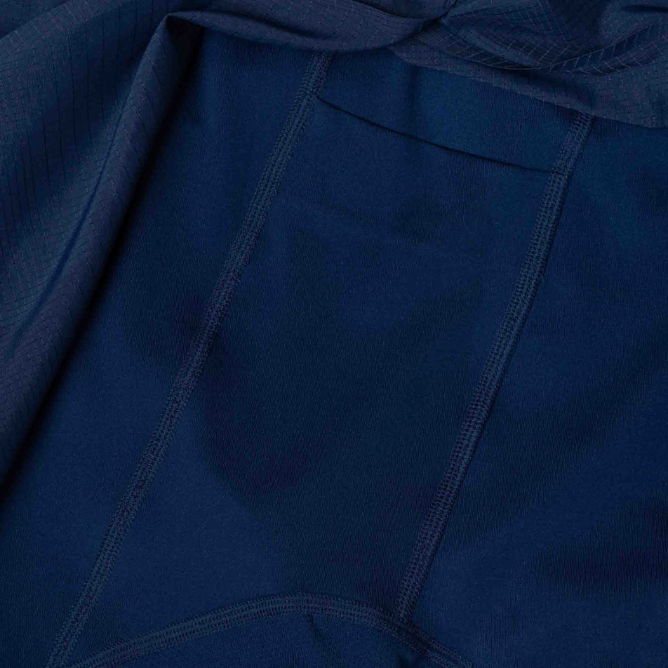 The drop in pocket on the side of the inner liner on the Ronhill Women's Tech Race Twin Short in the Dark Navy/Razzmatazz colourway. (8583390822562)