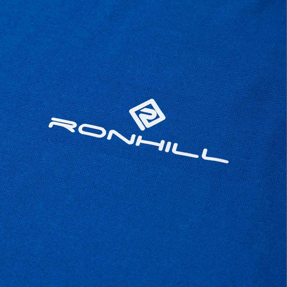 Close-up of the Ronhill logo on a Ronhill Men's Core Vest in the Dark Cobalt/Bright White colourway. (8470872752290)