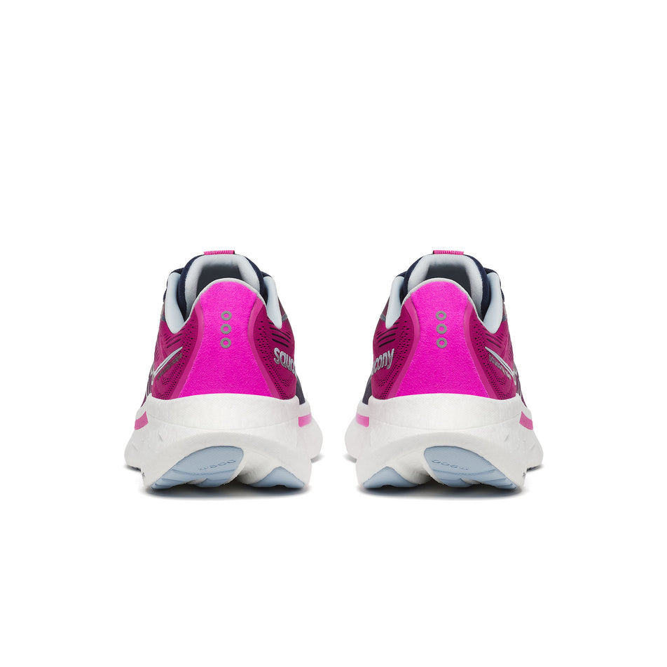 The back of a pair of Saucony Women's Ride 18 Running Shoes in the Navy/Fuchsia colourway. (8551139901602)