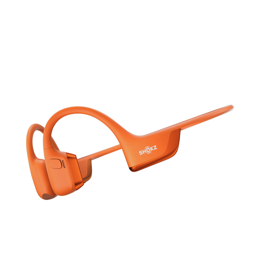 A pair of Shokz Unisex OpenRun Pro 2 Wireless Bone Conduction Headphones in the Orange colourway.  (8541428088994)