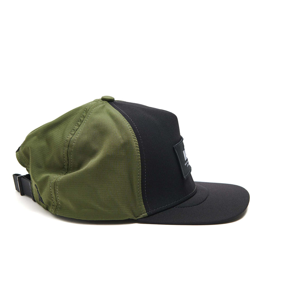 A VAGA Unisex Trucker Cap in the Moss Green/Black colourway. (8551965163682)