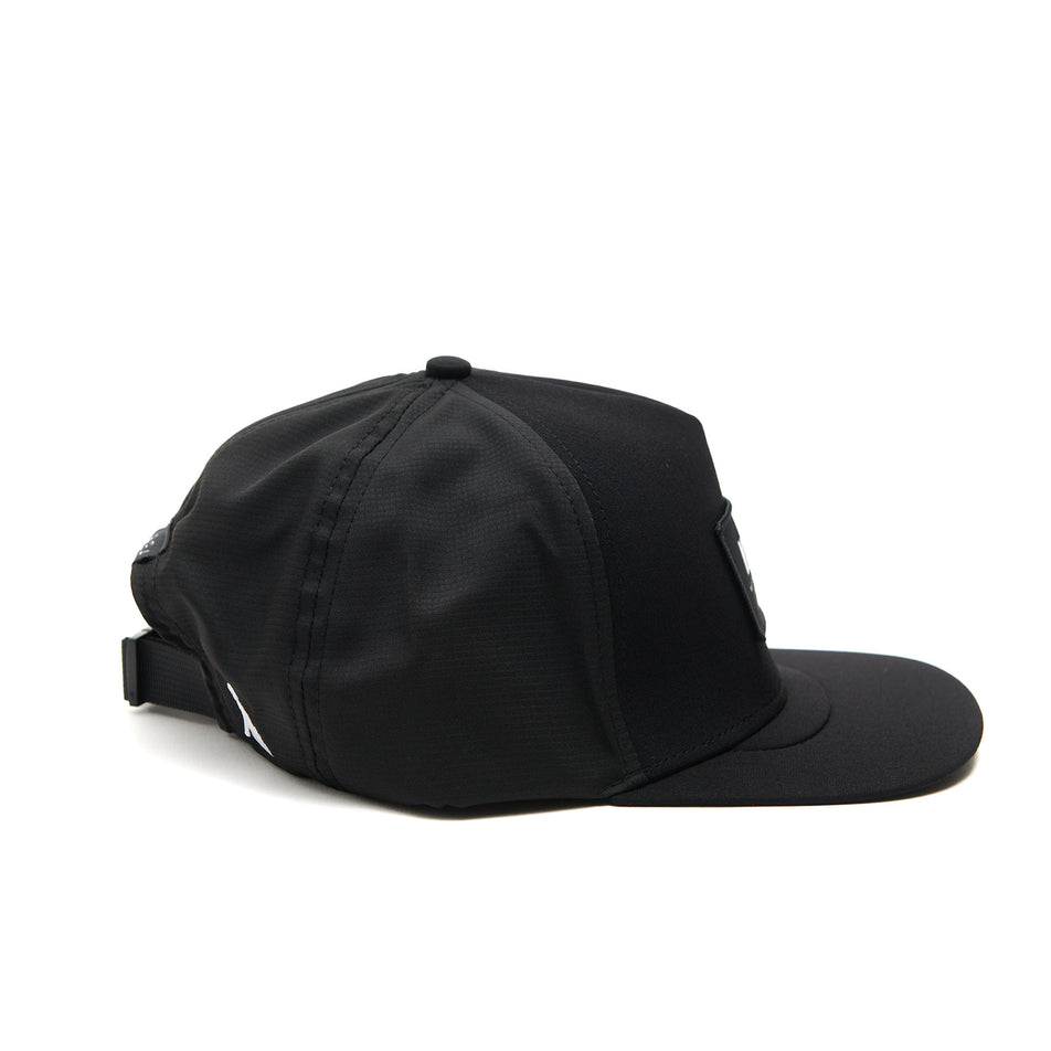 A VAGA Unisex Trucker Cap in the Storm Black colourway.  (8551962902690)