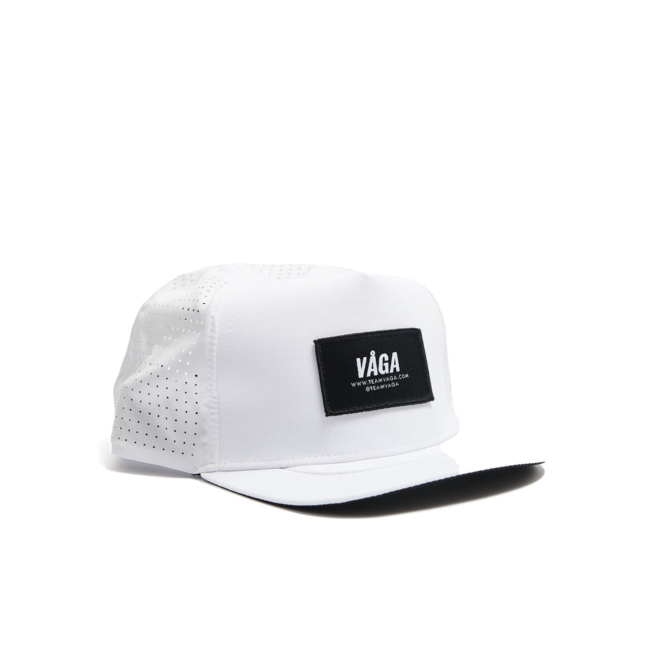 Front view of a VÅGA Unisex Trucker Cap in the White/Black colourway. (8487003095202)