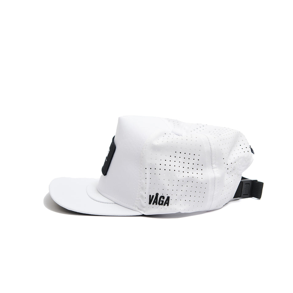 Side view of a VÅGA Unisex Trucker Cap in the White/Black colourway. (8487003095202)