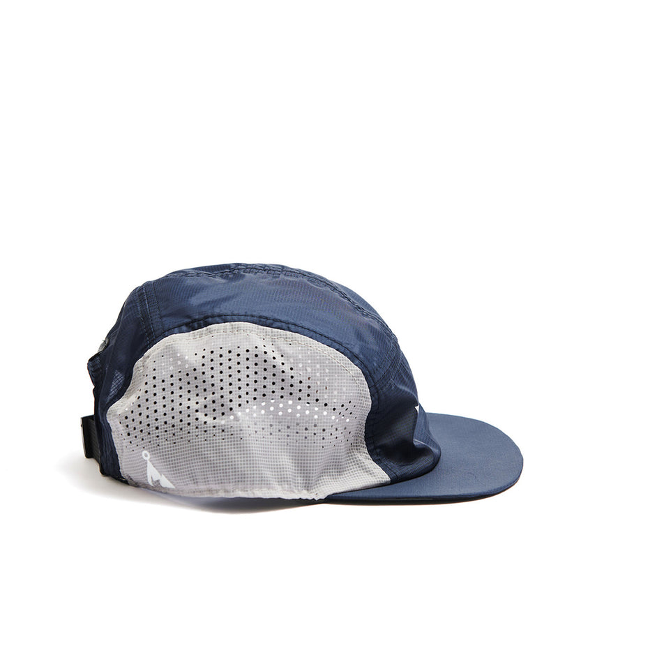 Side view of a VÅGA Unisex Wind Resistant Feather Racing Cap in the Navy/Light Grey/Charcoal/Black colourway. (8486900007074)