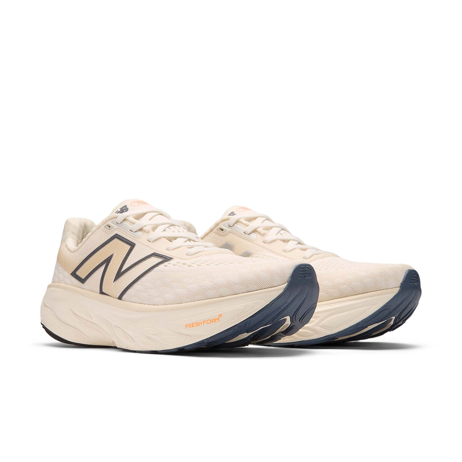 A pair of New Balance Women's Fresh Foam X 1080 V14 Running Shoes in the Sea Salt colourway. (8568698994850)