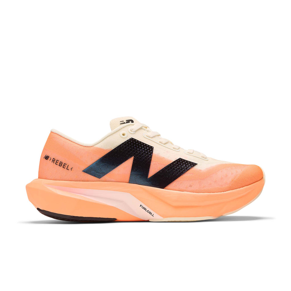 Lateral view of the right shoe from a pair of New Balance Women's FuelCell Rebel V4 Running Shoes in the Hot Mango colourway. (8569898369186)