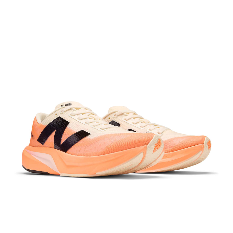 A pair of New Balance Women's FuelCell Rebel V4 Running Shoes in the Hot Mango colourway. (8569898369186)